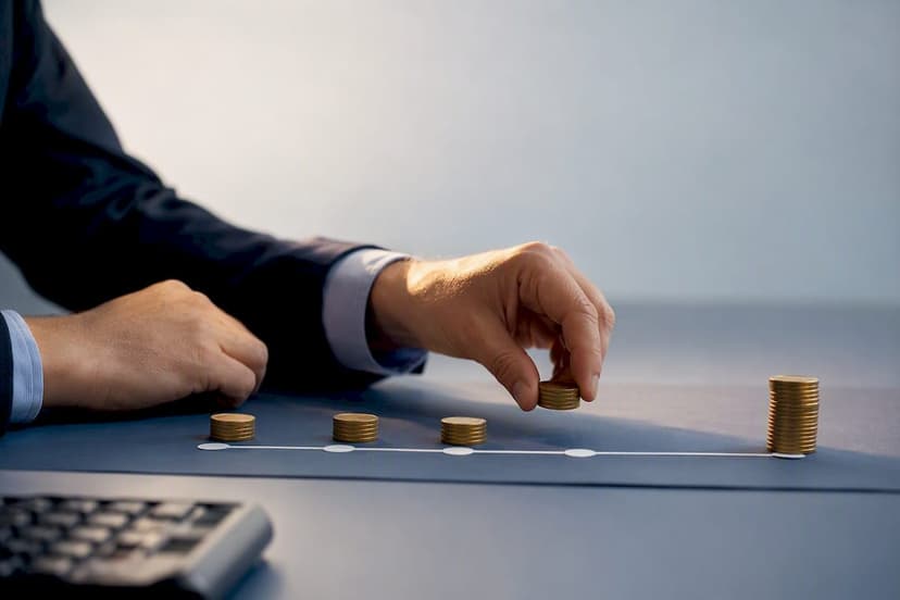 Coins arranged along an investment cash flow timeline